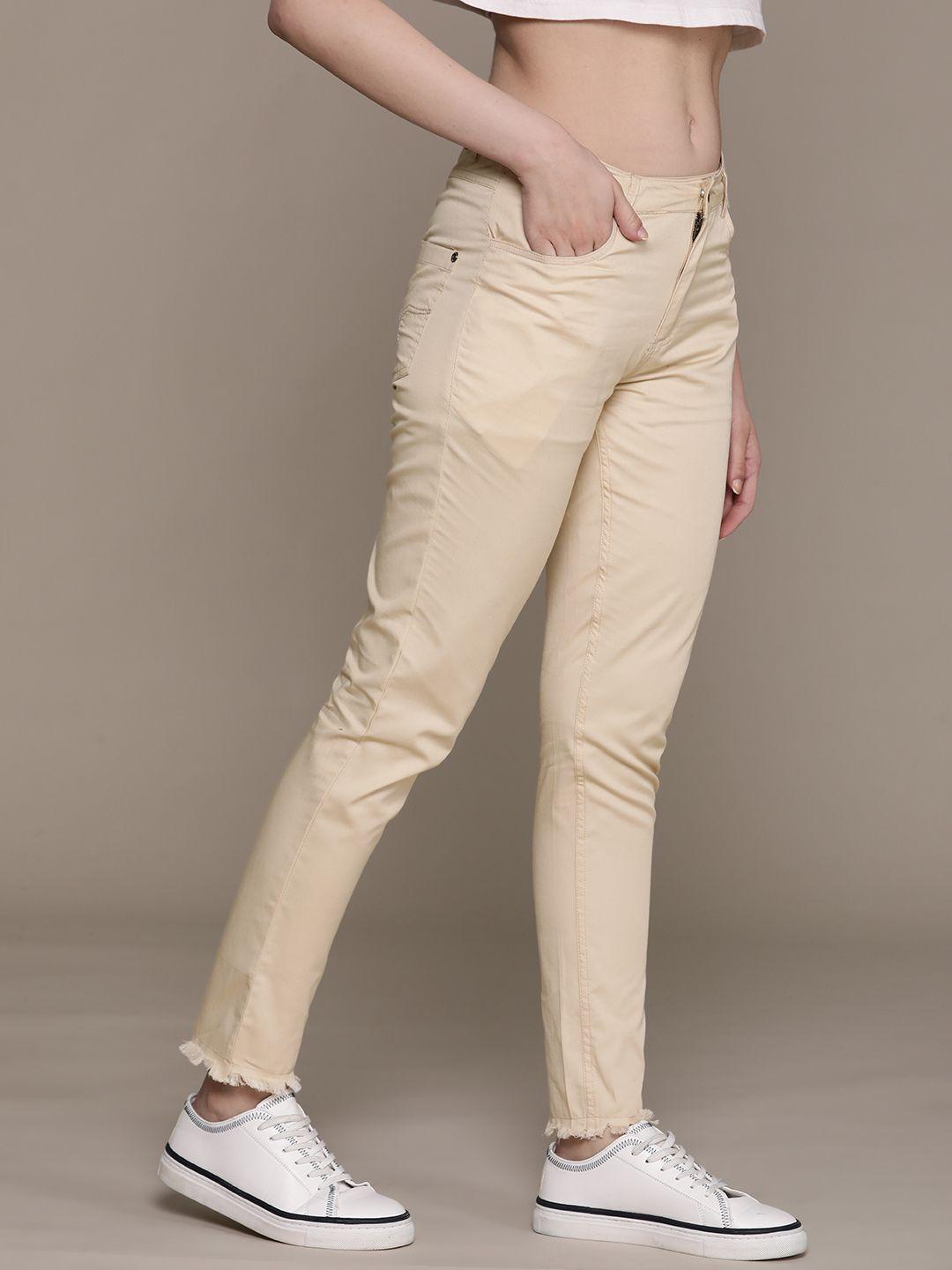 roadster women solid slim fit chinos trousers