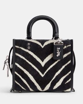 rogue 20 in haircalf with zebra print sling bag