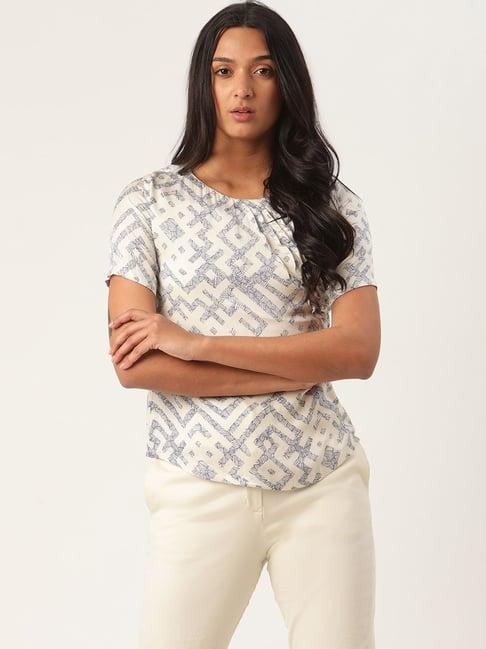 rooted white printed top