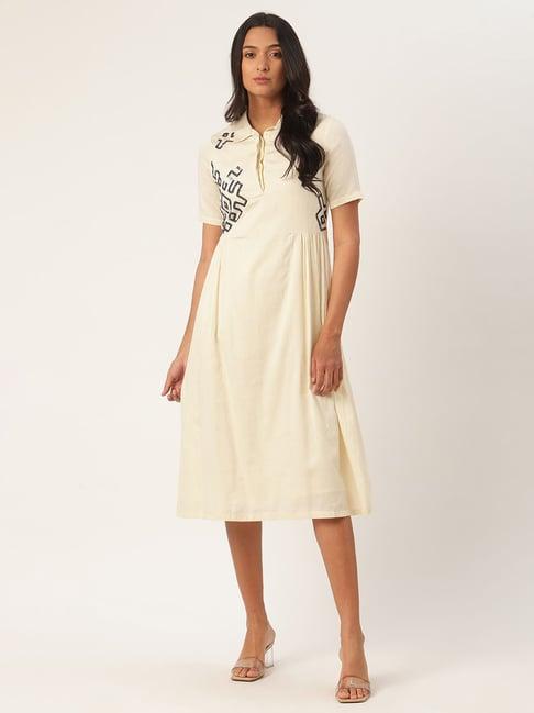 rooted cream embellished dress