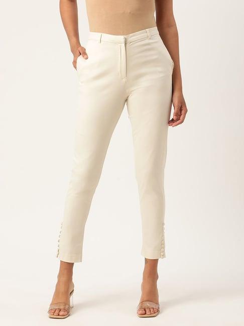 rooted white mid rise trousers