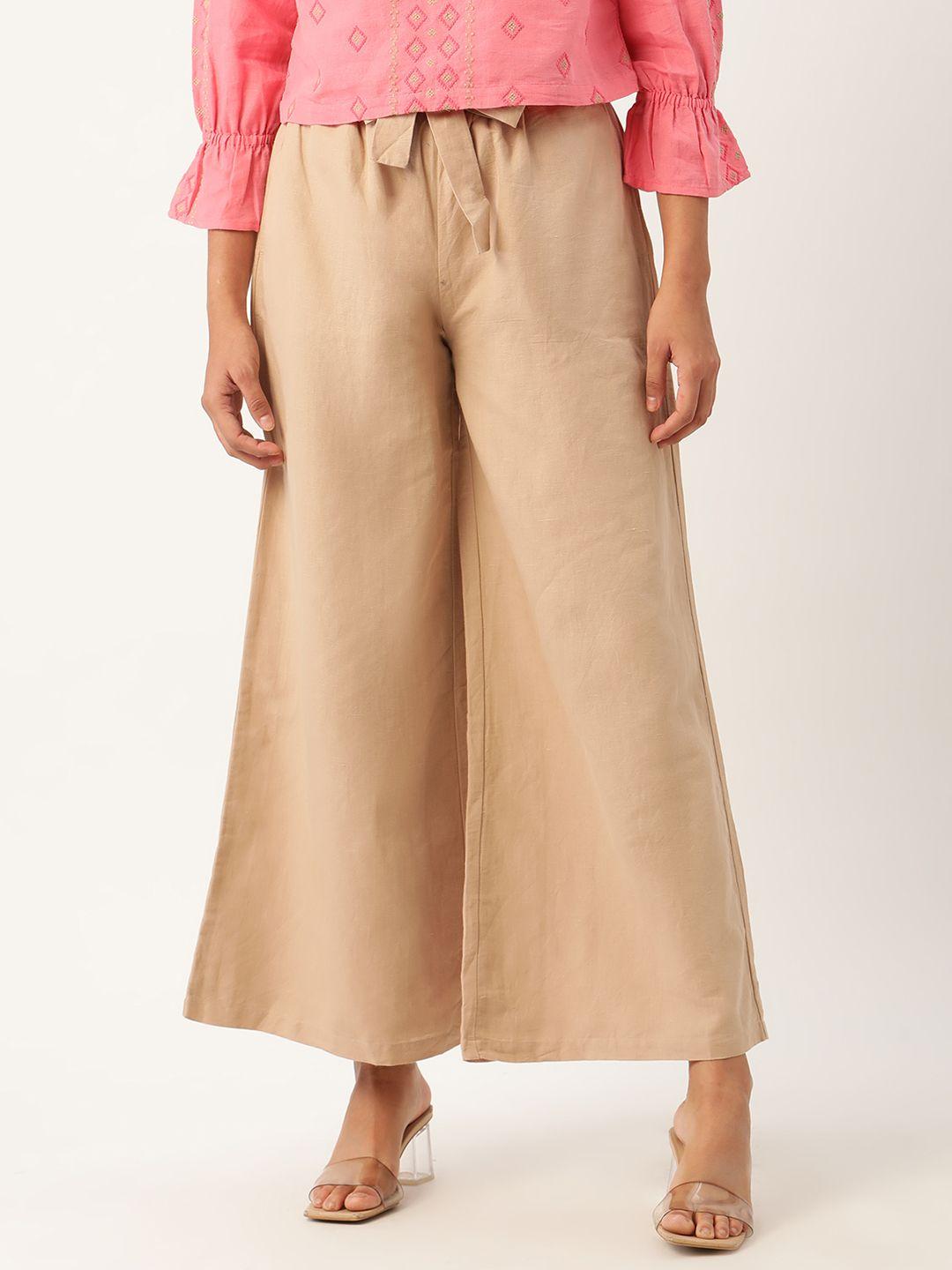rooted women beige regular fit solid parallel trousers