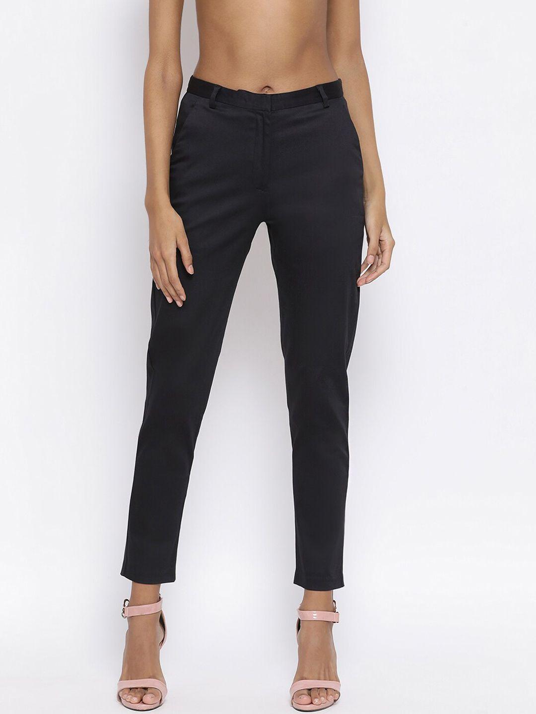 rooted women black solid regular trousers