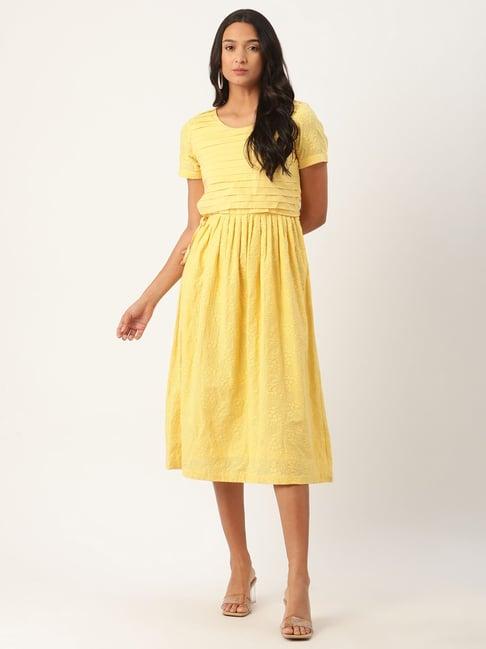 rooted yellow embroidered dress