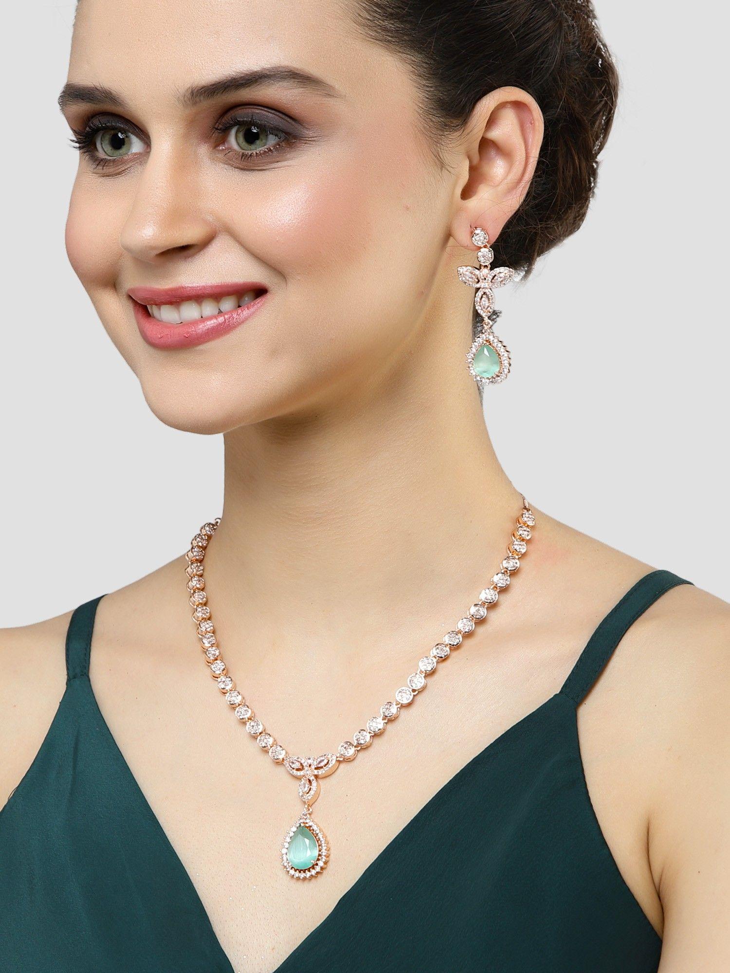 rose gold plated drop shape light green cubic zirconia studded necklace set