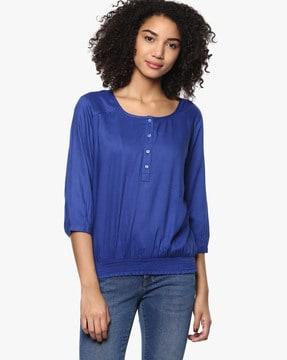 round-neck smocked top with cuffed sleeves