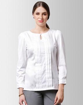 round-neck top with button-loop closure