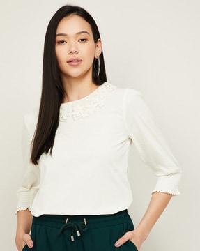 round-neck top with lace accent