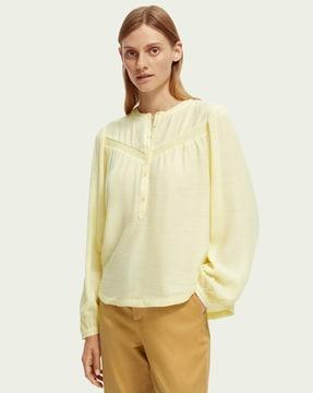 round-neck top with pleated accent