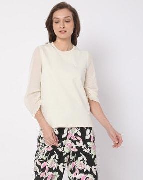 round-neck top with puff sleeves