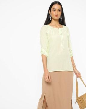 round-neck top with raglan sleeves