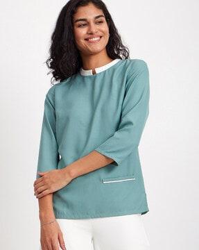 round-neck top with welt pockets