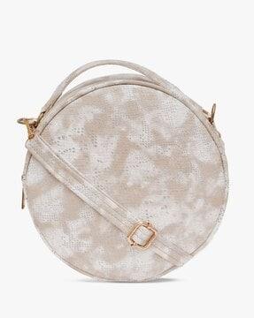 round sling bag with adjustable strap