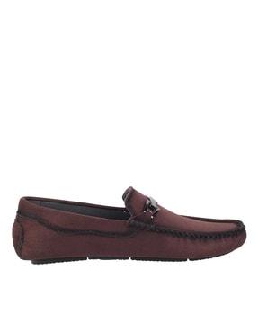 round-toe slip-on loafers with metal accent