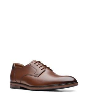 round-toe stacked-heel derbys