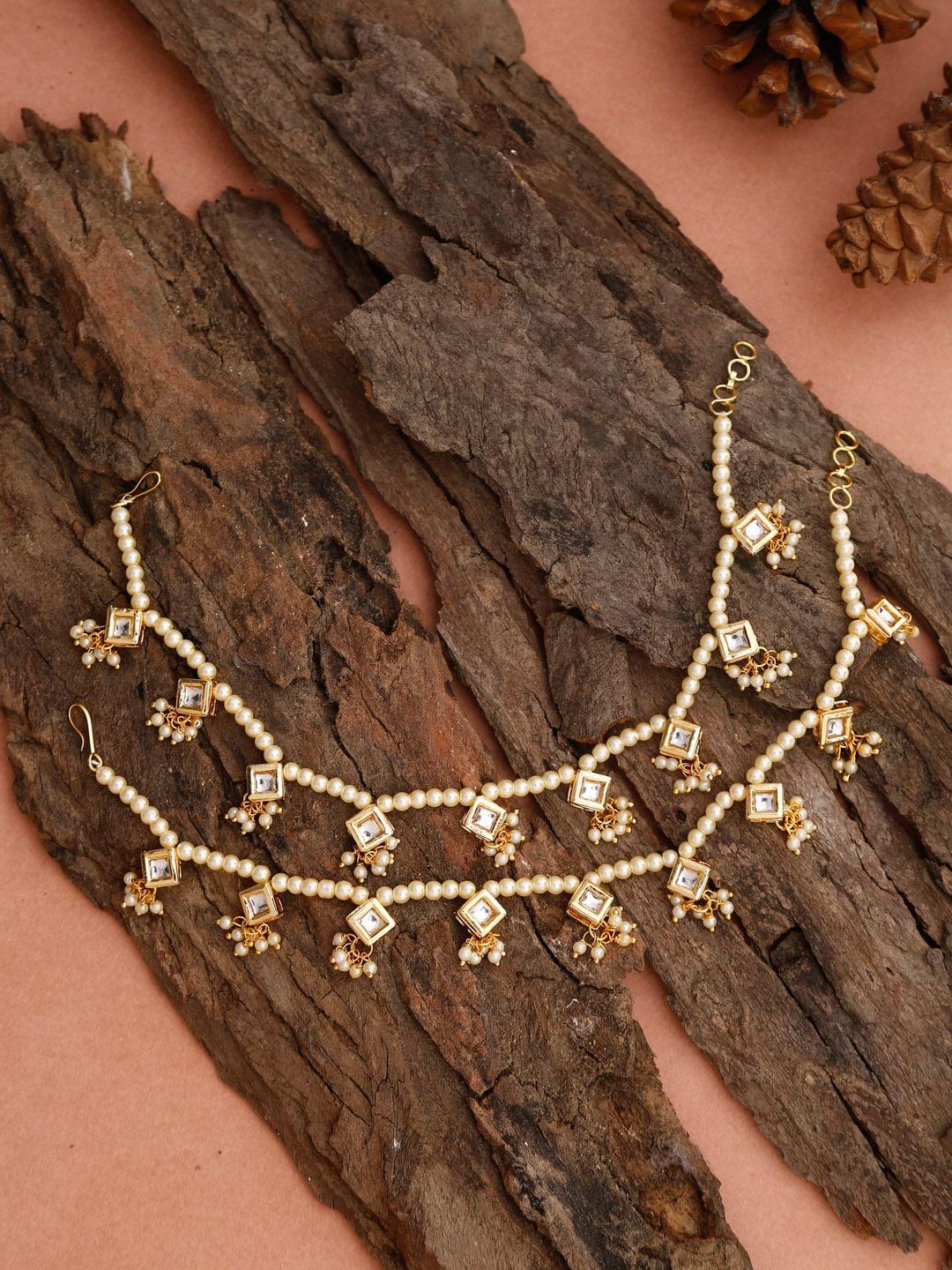 ruby raang set of 2 white & gold-toned & plated kundan anklets