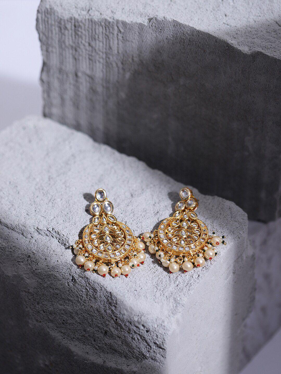 ruby raang gold-toned & white kundan contemporary gold-plated chandbalis earrings