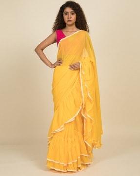 ruffled saree with pom pom