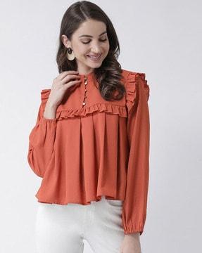 ruffled top with button accent