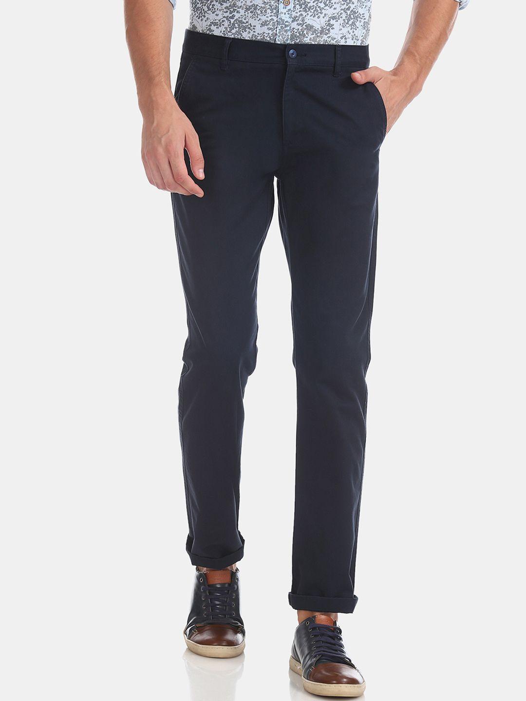 ruggers men navy blue slim fit solid regular trousers