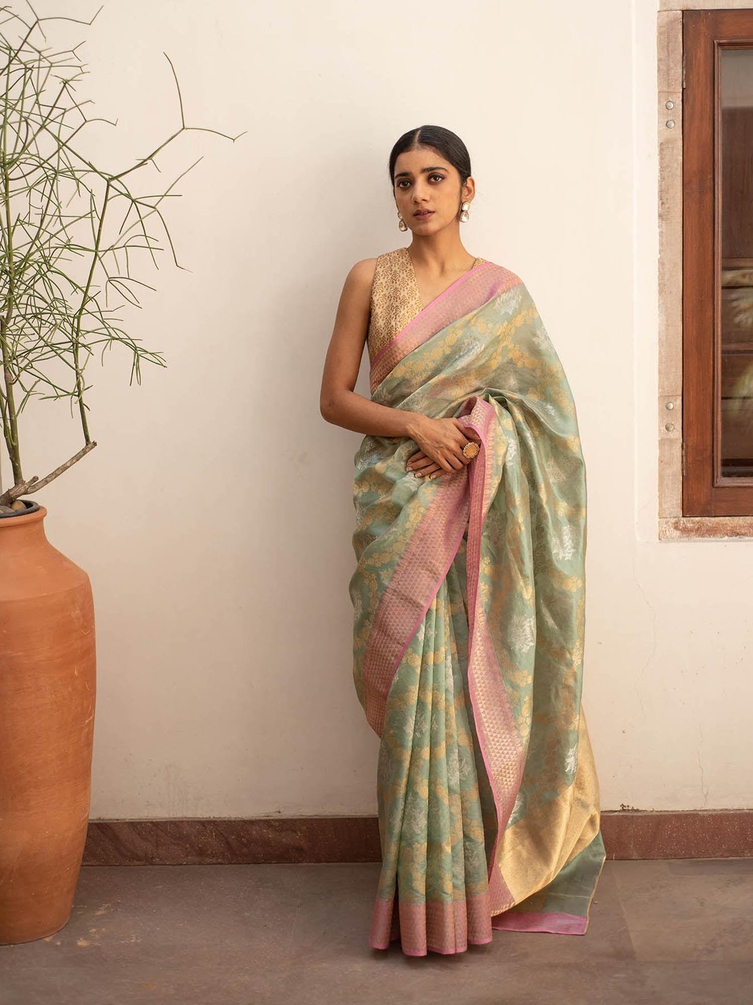 rumi - sage green silk saree with floral & geometric border with unstitched blouse