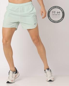 running shorts with logo print