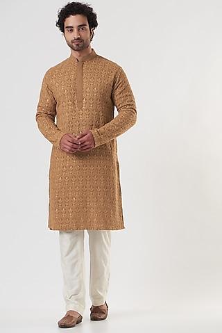 rust-colored embroidered kurta set