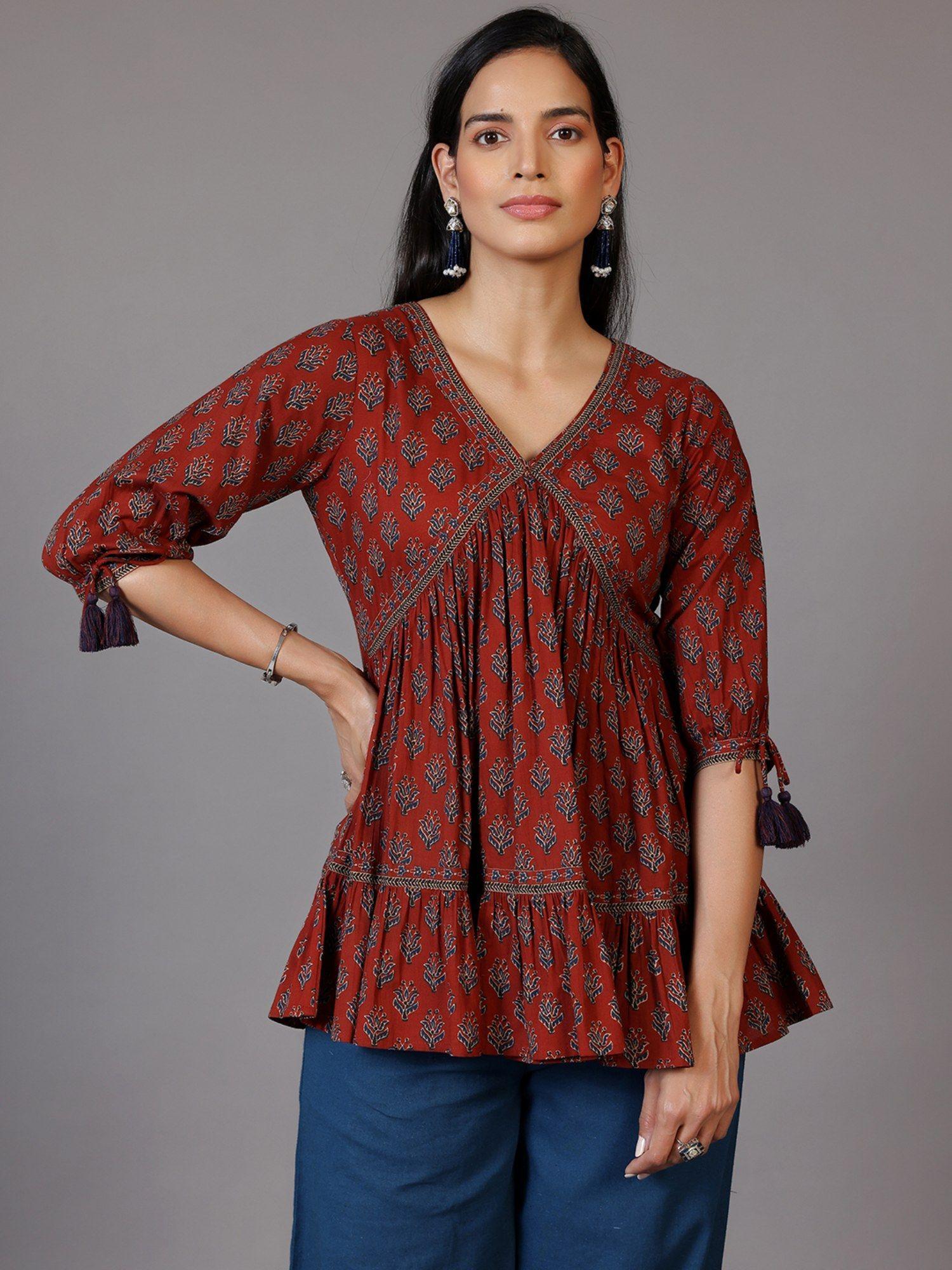 rust floral printed pleated panelled kurti with tassels