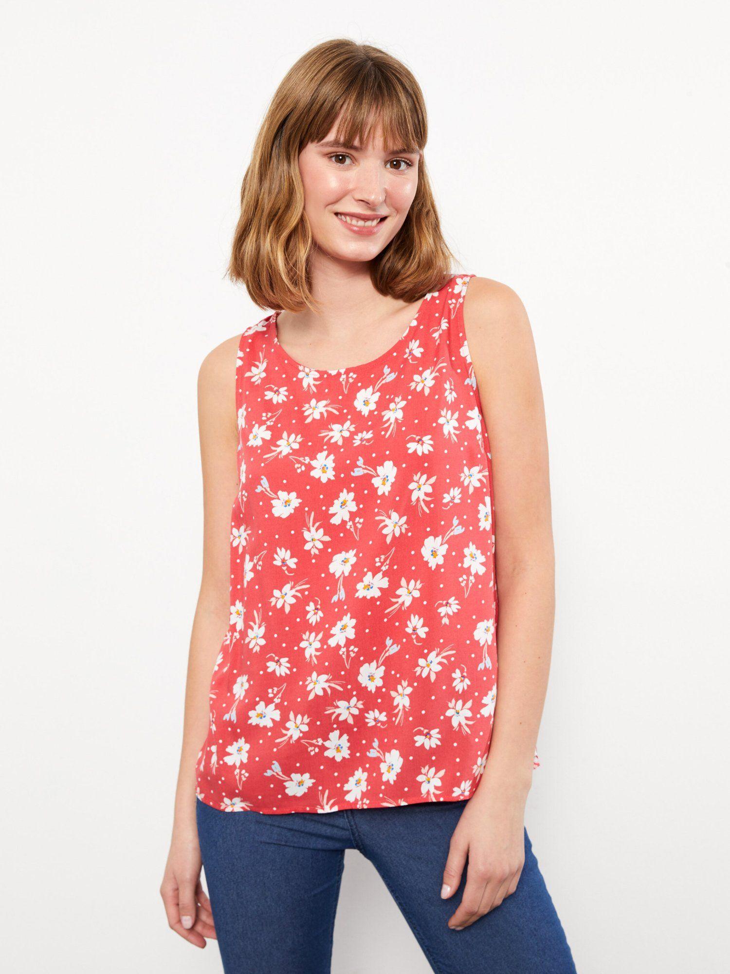 rust floral sleeveless top