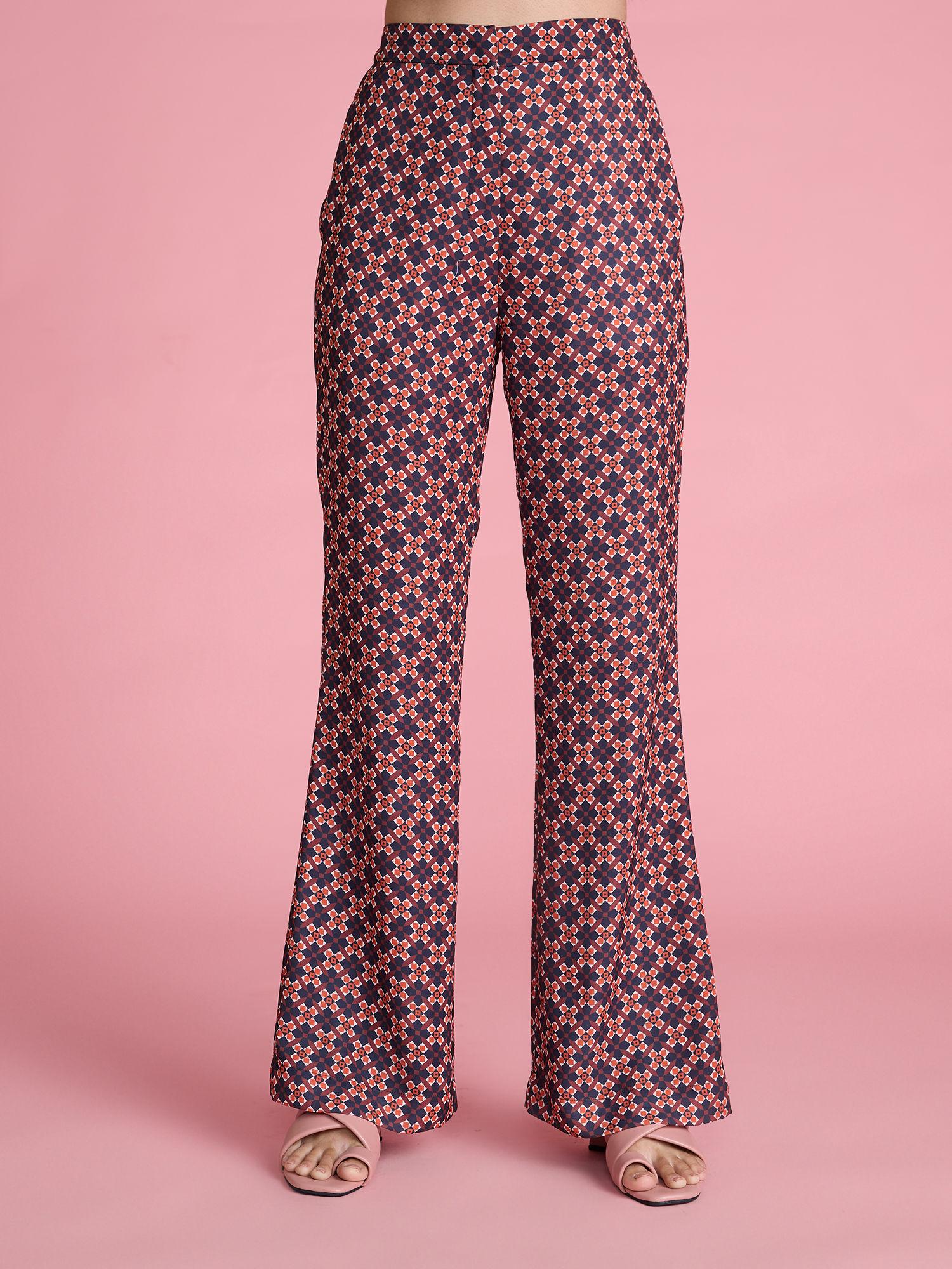 rust geometric print flared pants