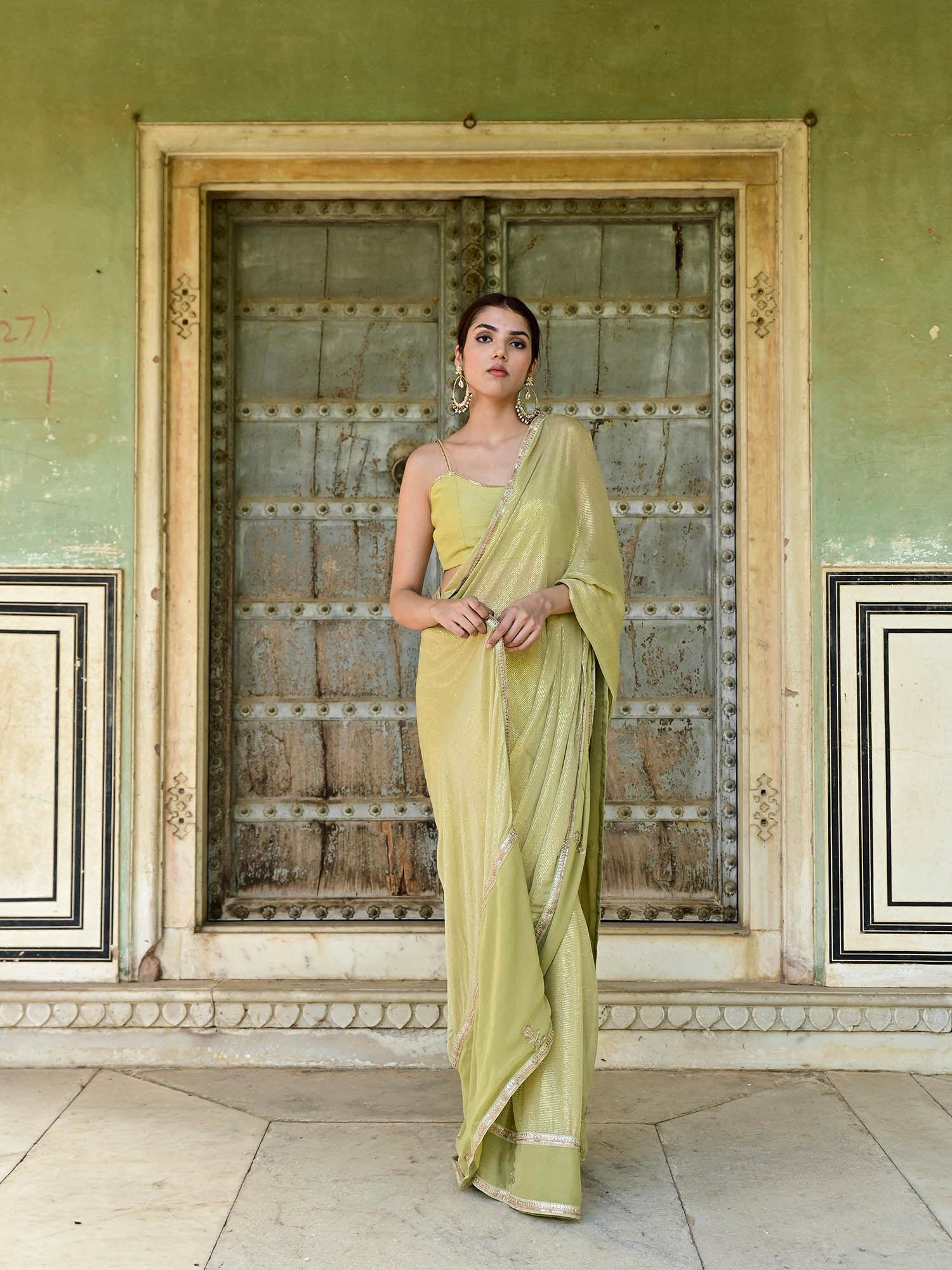 sada bahar green embellished saree with unstitched blouse