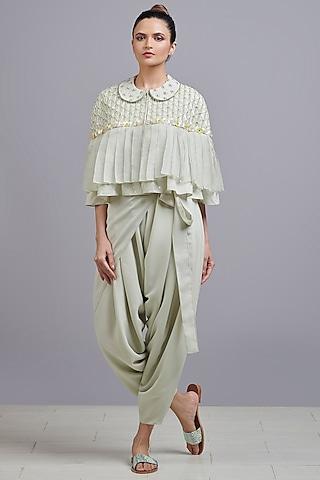 sage green jumpsuit with hand embroidered cape