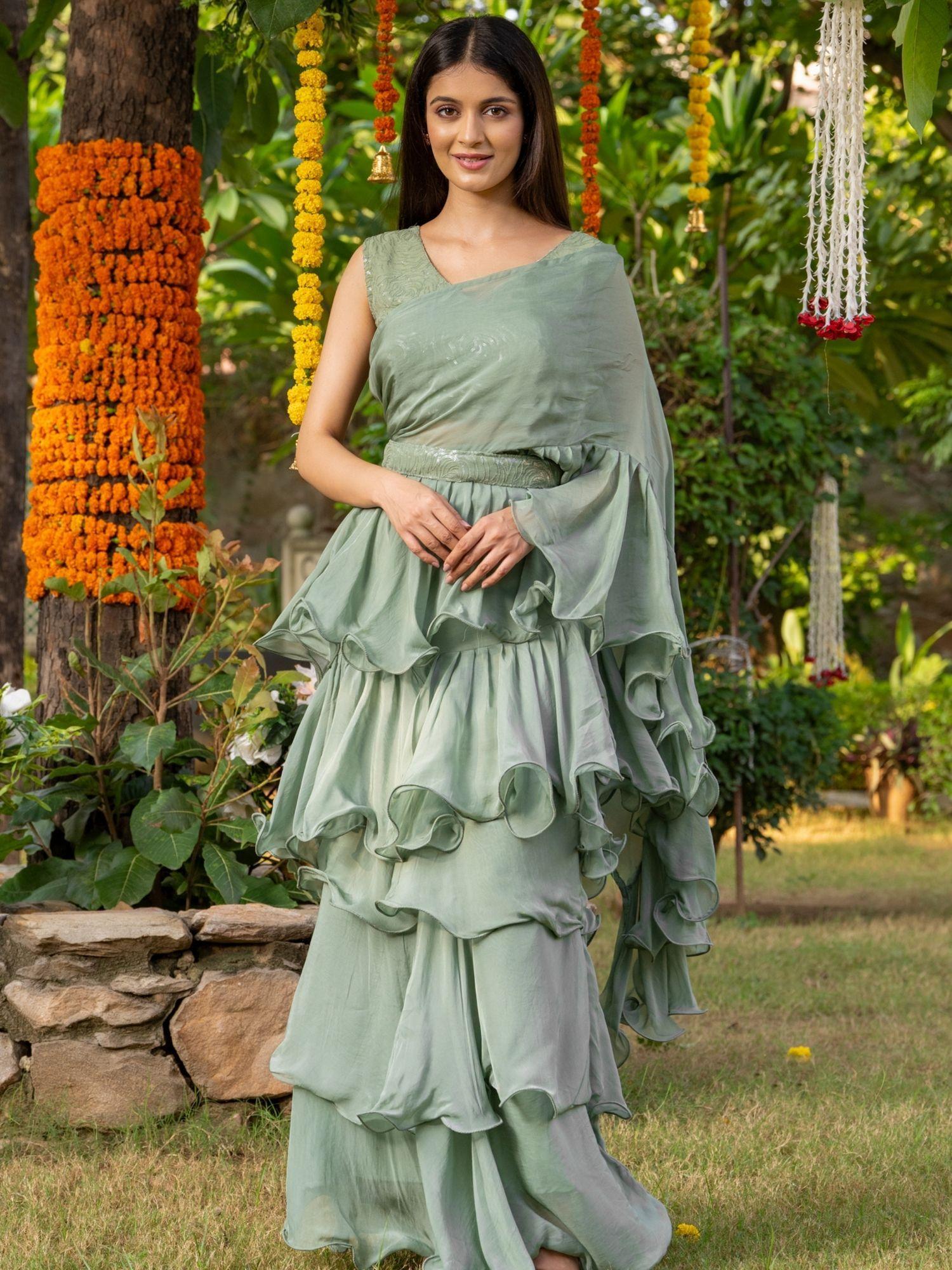 sage green ruffle saree with stitched blouse