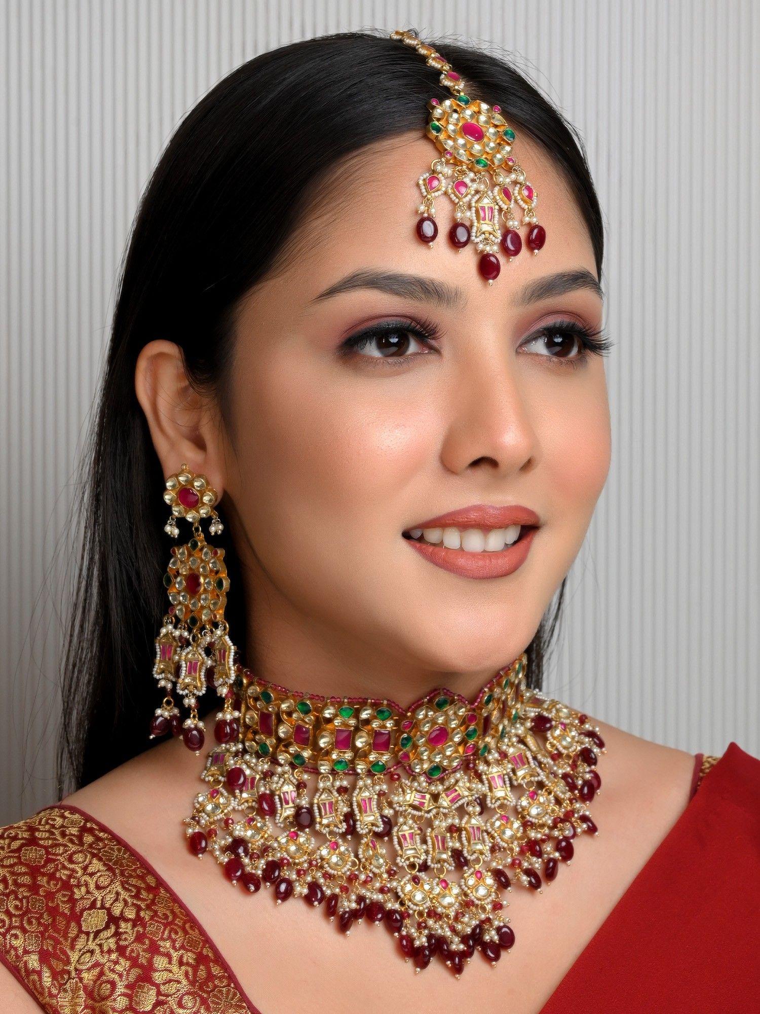 saksham maroon and green kundan choker set