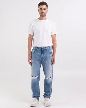 sandot relaxed fit broken edge mid-wash jeans