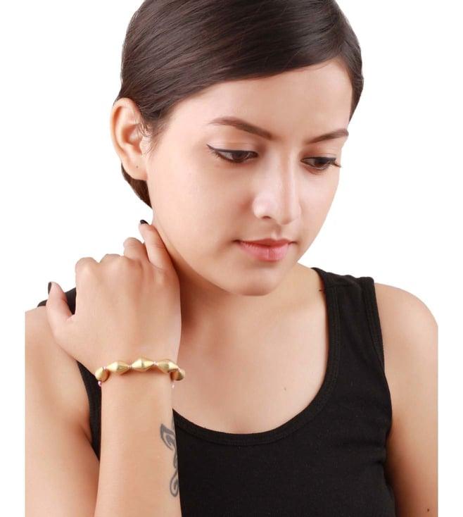 sangeeta boochra silver handcrafted gold plated bracelet with tessels