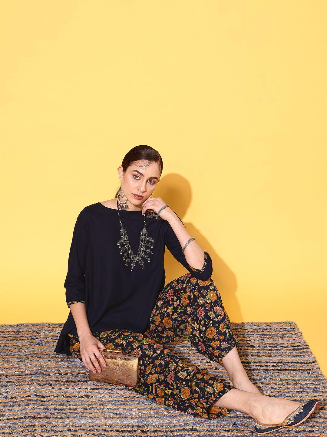 sangria high-low hem top with printed trousers