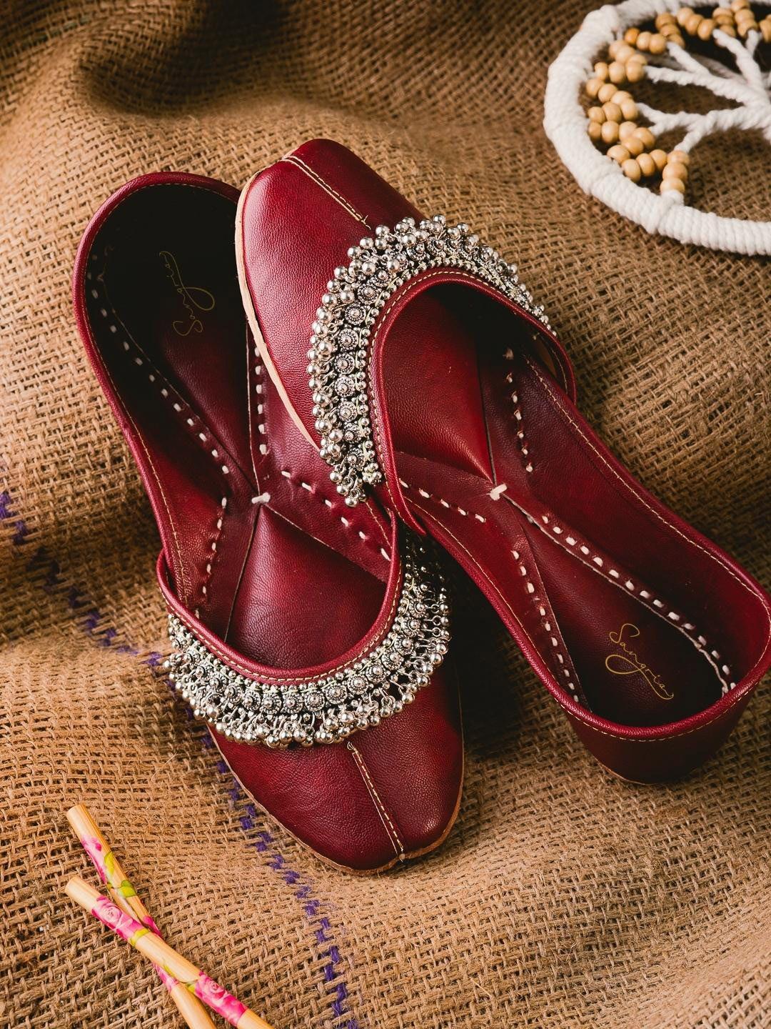 sangria maroon and silver-toned embellished leather mojaris