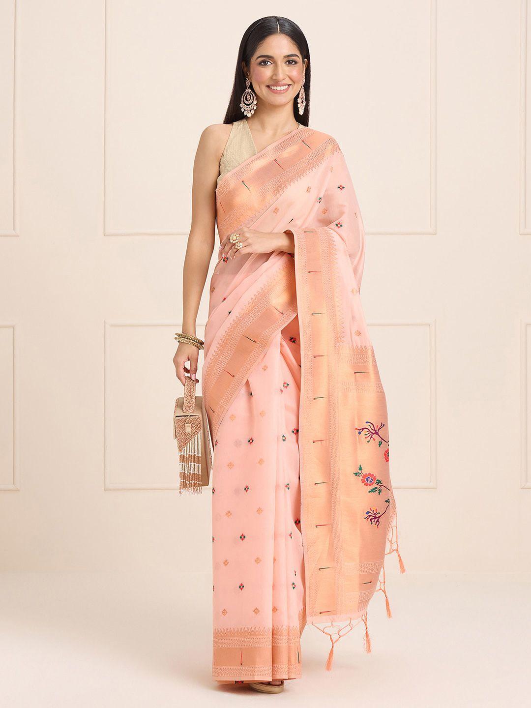 sangria peach coloured ethnic motifs woven design sarees