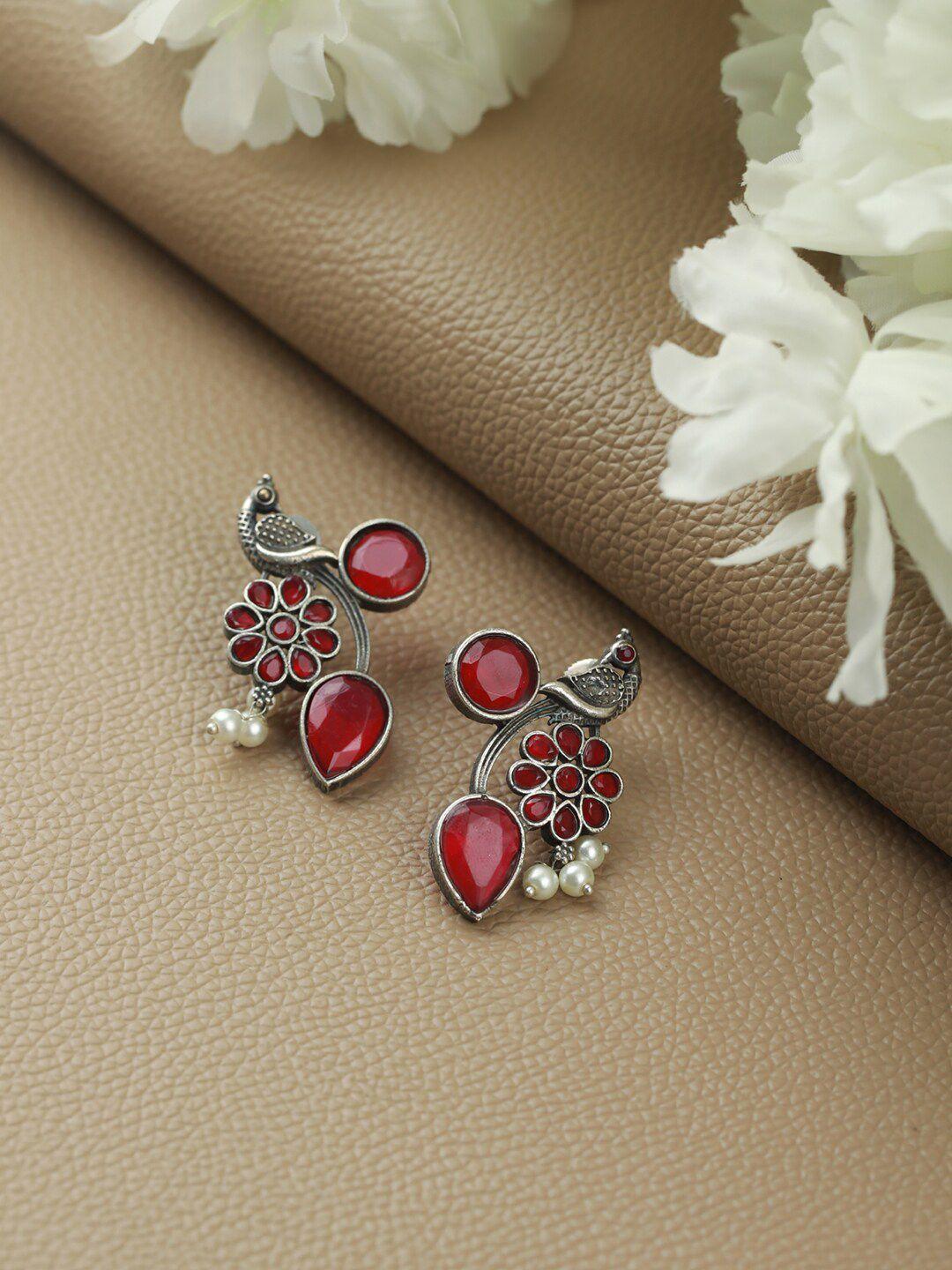 sangria silver plated stone studded peacock shaped drop earrings
