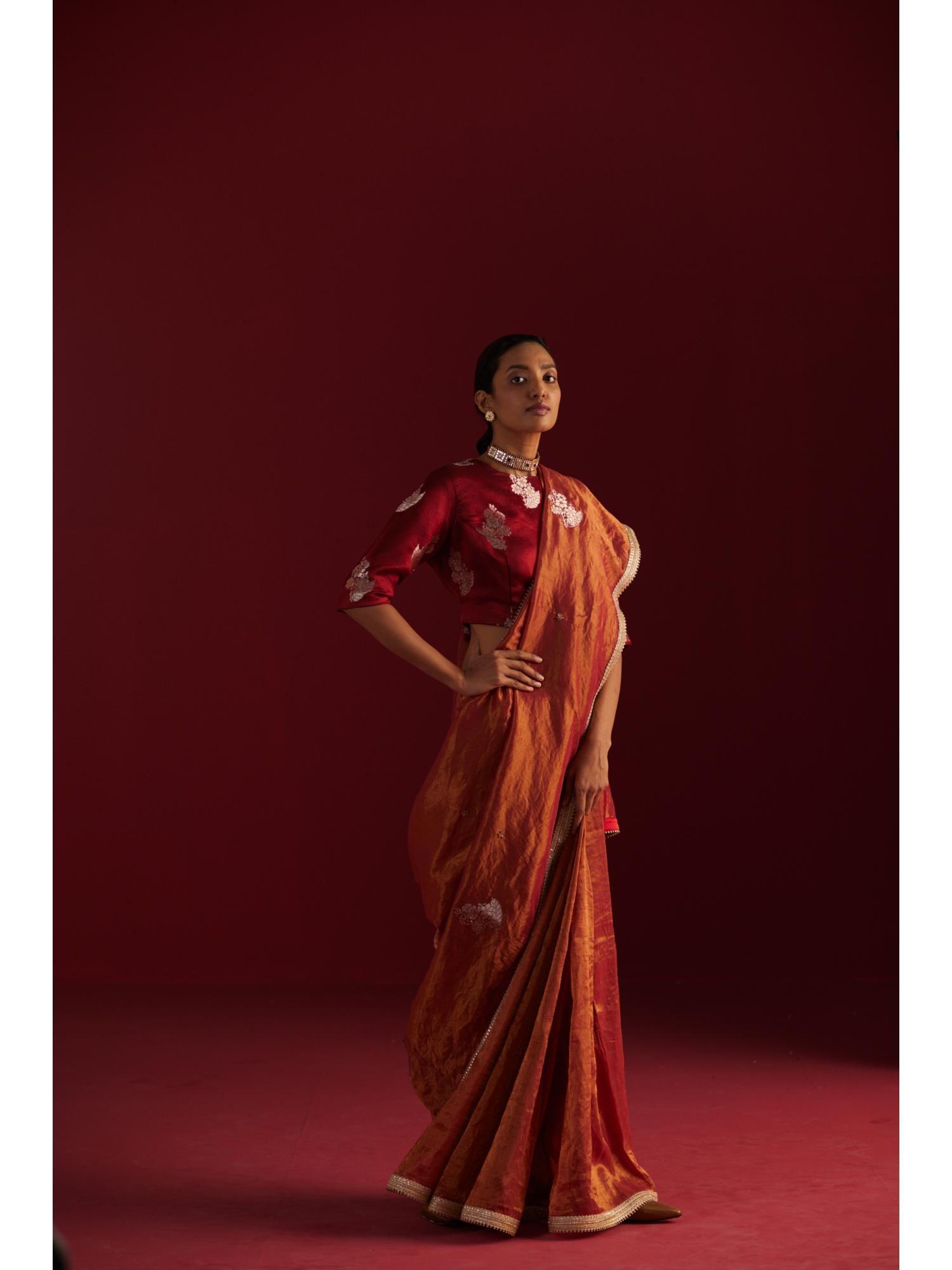 saree in red handloom tissue with applique work without blouse