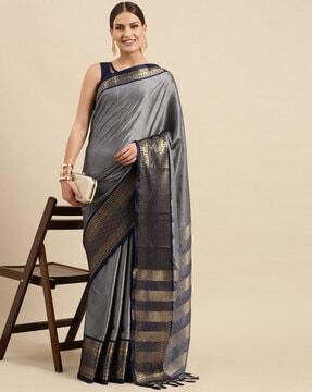 saree with contrast border and tassels