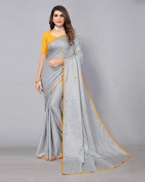 saree with pom pom accent