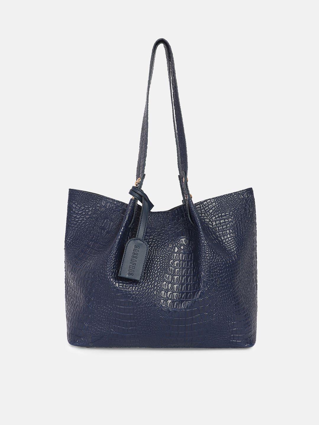 sassafras blue textured pu structured shoulder bag with tasselled