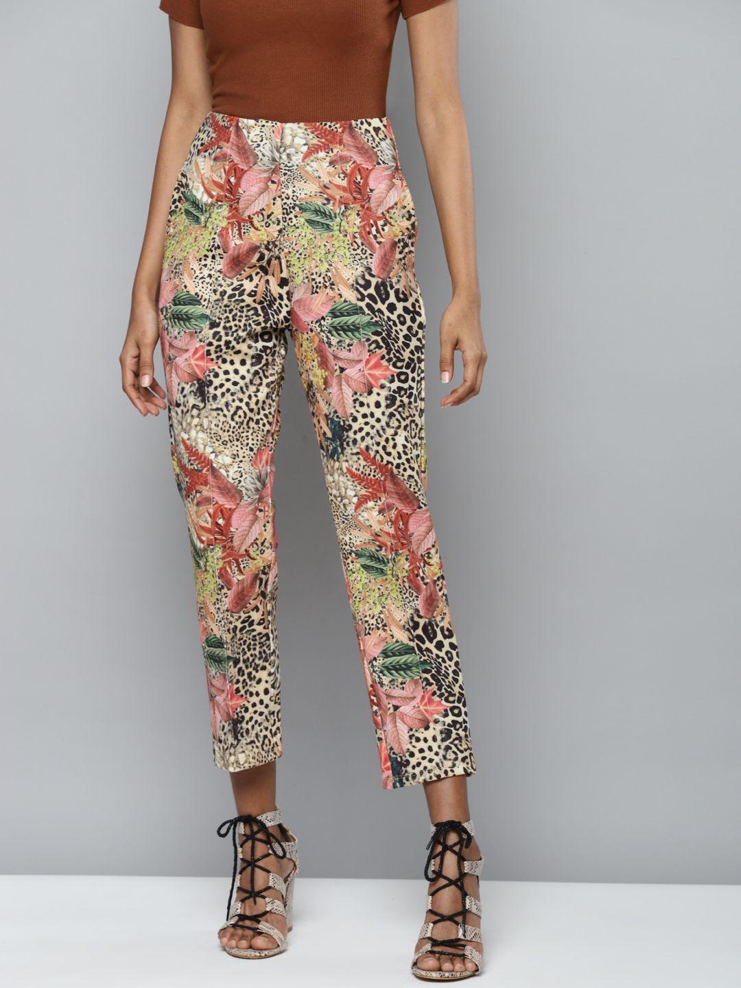 sassafras women beige floral printed tapered fit high-rise trousers