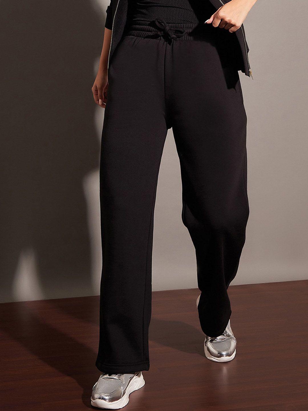 sassafras women black relaxed fit mid-rise fleece track pants