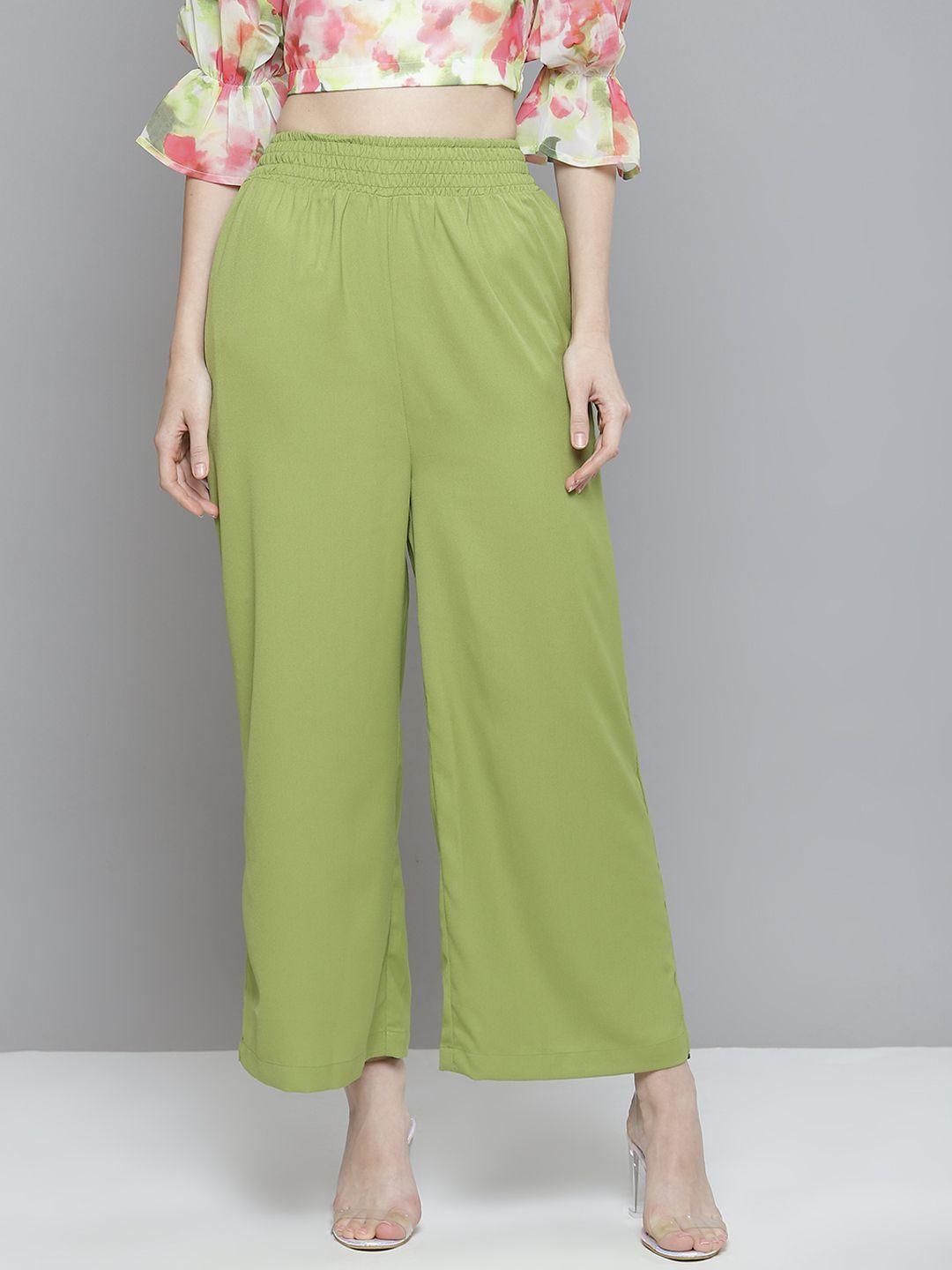 sassafras women green flared high-rise pleated trousers