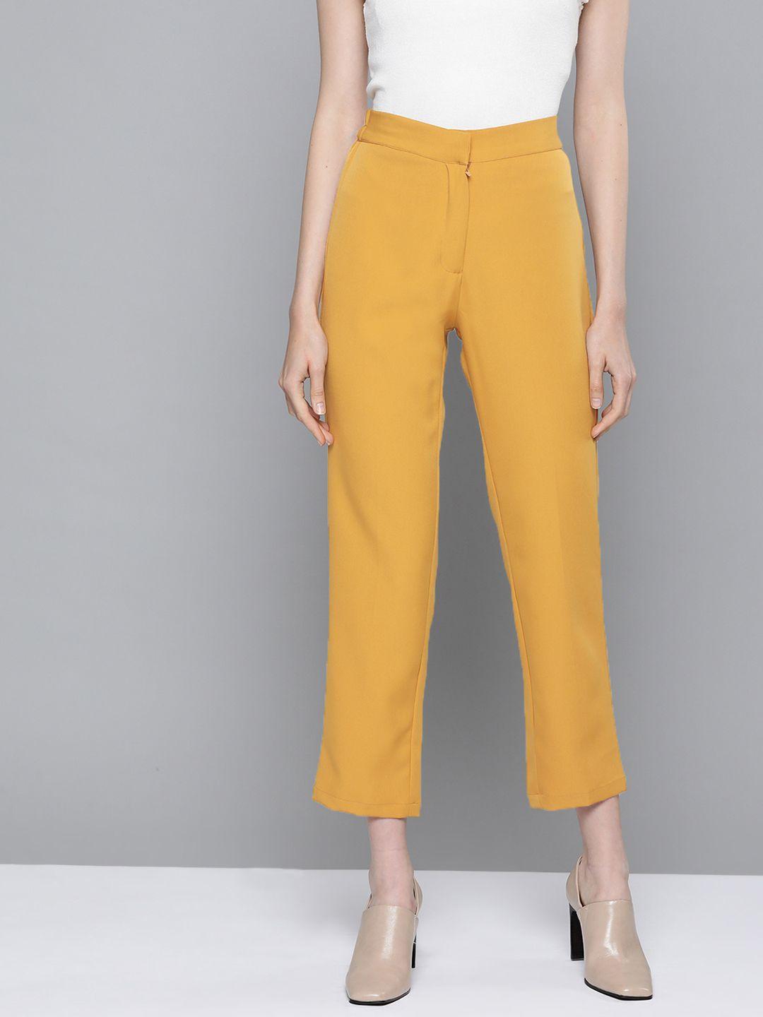 sassafras women mustard yellow tapered fit solid pleated trousers with belt