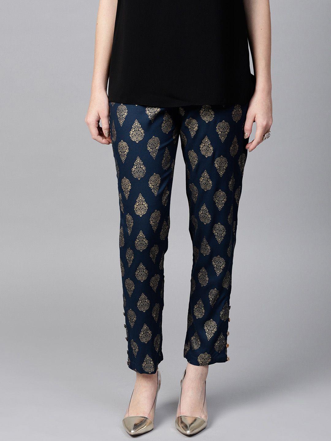 sassafras women navy blue & golden tapered fit printed trousers