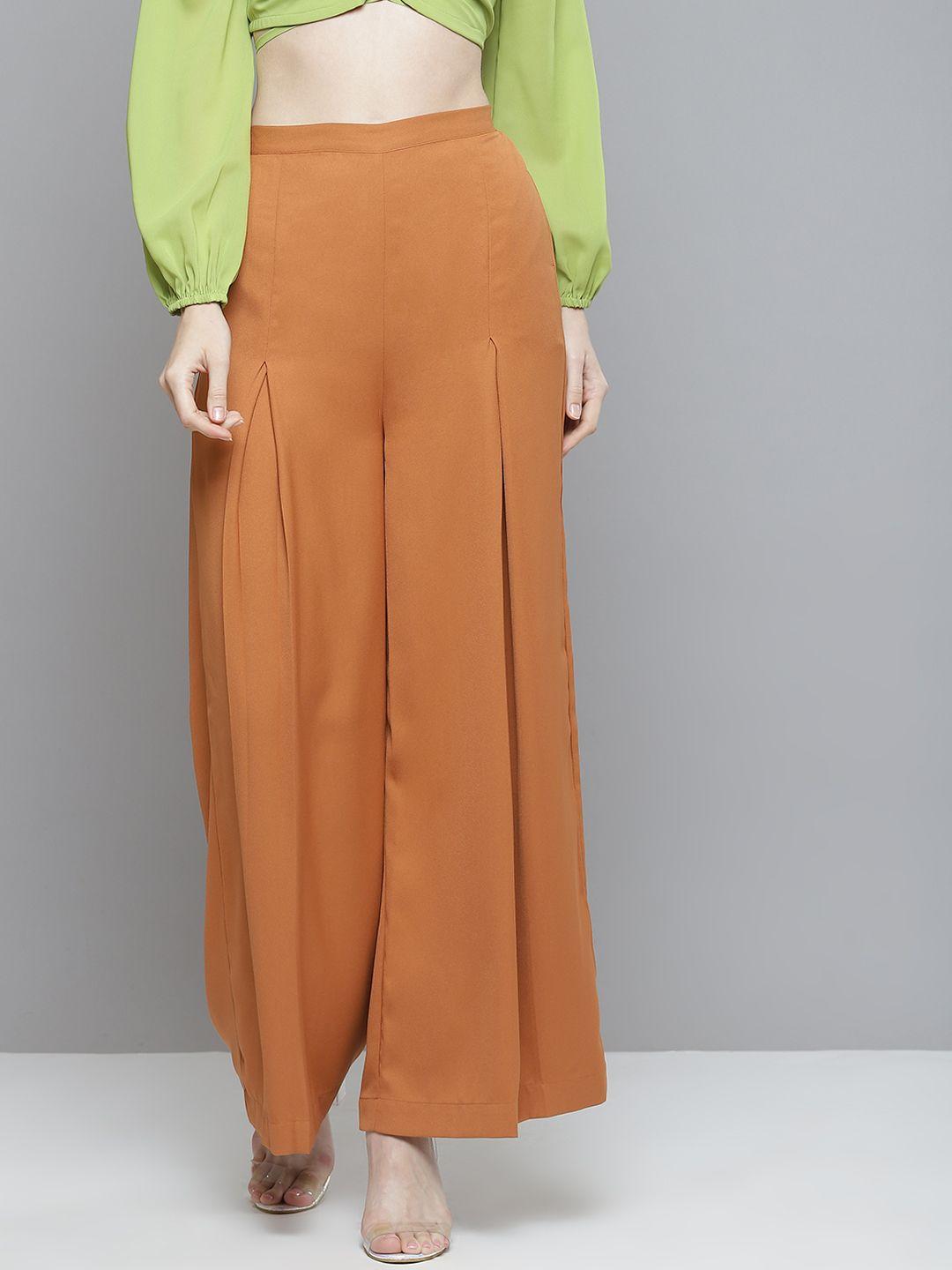 sassafras women rust orange flared high-rise trousers
